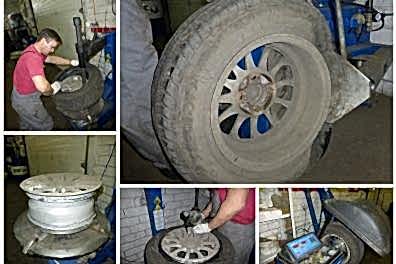 Мастер балансирует колеса